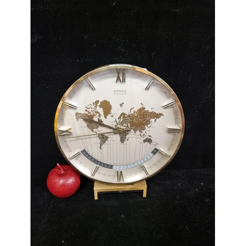 106 - Star Lot : A stunning example of 1970's KIENZLE Chronoquartz clock. A large heavy brass clock, with ... 