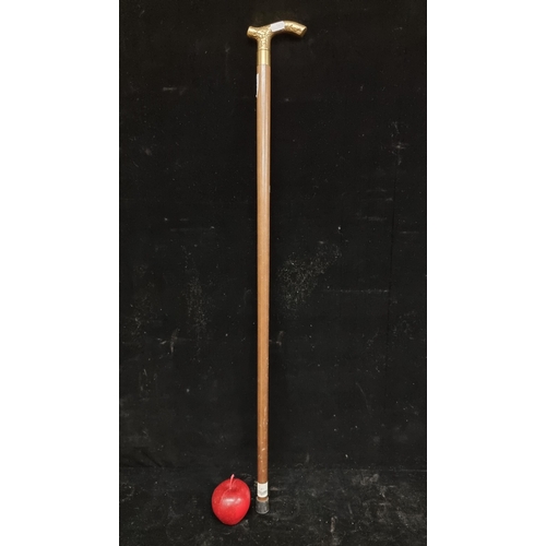 165 - A beautiful well made wooden walking stick with brass handle cast with handsome foliate detail and a... 