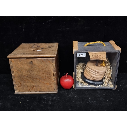 221 - Two wooden items including a coaster set by an Irish designer Franz Caffrey in original glass presen... 