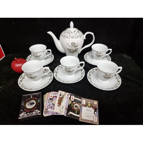 229 - A brilliant lot of Hendrick's Gin related items, including five cups and saucers and a teapot decora... 