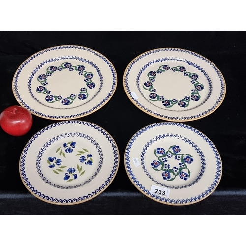 233 - Four Nicholas Mosse dinnerware, including two side and two dinner plates. Three in Pansy pattern and... 