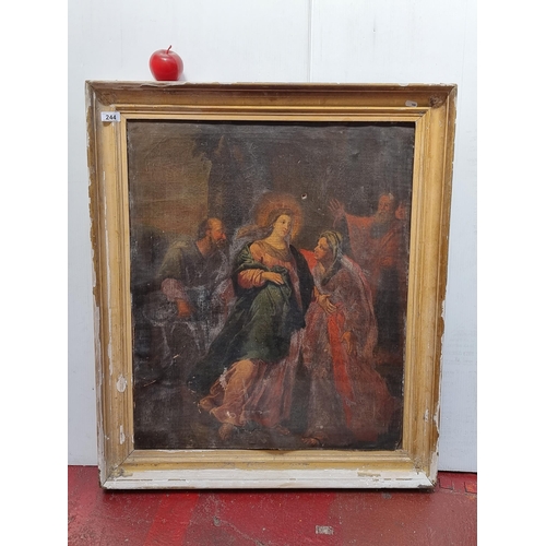 244 - A large possibly 18th century oil on canvas painting featuring a biblical scene with a haloed Mary i... 