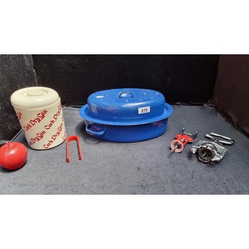 270 - Four kitchenware items including an enamelled casserole oval dish, a Scorpion extending cork screw a... 