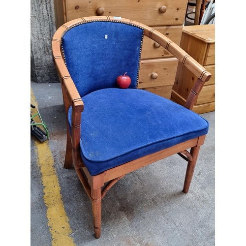 289 - A charming wooden open arm chair with soft royal blue upholstery and brass stud detailing. Really lo... 