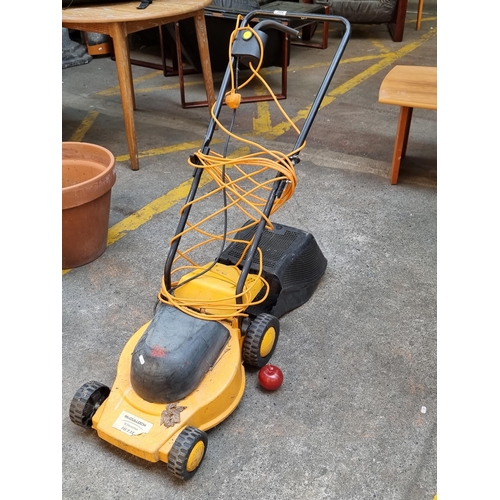 304 - A McCulloch electric lawnmower model 1033E with basket.