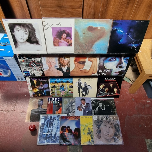 309 - A great selection of vinyl records including music by Kate Bush x 2 , Dire Straits, Eurythmics, Prin... 