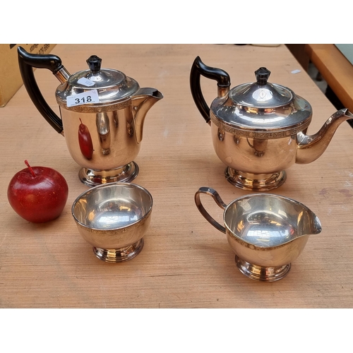 318 - Four pieces of silver plated items by Viners of Sheffield including a coffee pot, teapot, a milk and... 