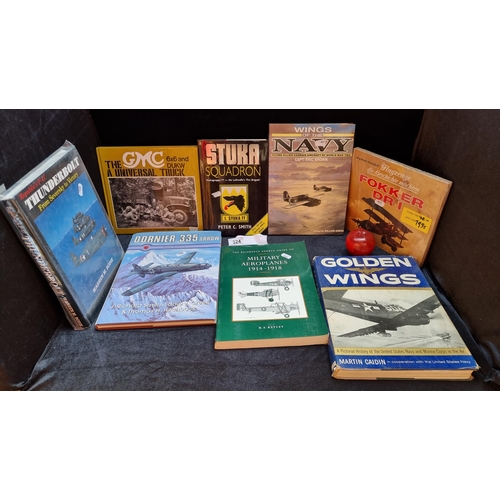 324 - 8 hardcover books of a military interest including 