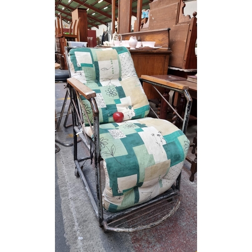 326 - An industrial style vintage chair - formerly used as a possible restraint chair. Evidence of where r... 