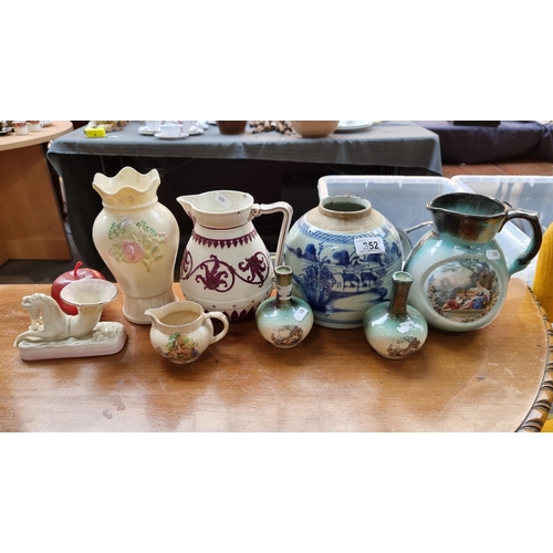 352 - A collection of 8 ceramic and porcelain decorative items including a W.B Colbridge decorative pitche... 