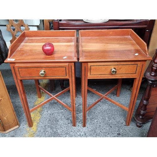 377 - A great pair of ships style bedside lockers, with a gallery back, single drawer, black linear inlay ... 