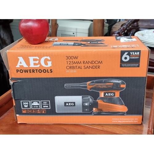 383 - An AEG Powertools 300W, 125MM Random Orbital Sander. New, in original packaging.