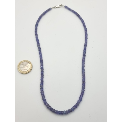 404 - A graduated blue amethyst necklace,, set with nice sterling silver lobster clasp. Length of necklace... 