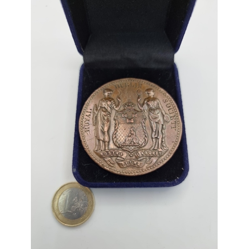 415 - A very interesting antique medallion from the Royal Dublin Society awarded to a  W Byrne for plumbin... 