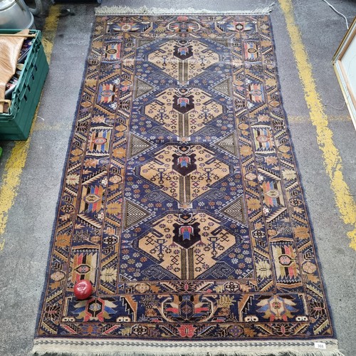 368 - Star Lot : A Super handmade, hand knotted Persian floor rug with geometric tribal design of a varied... 