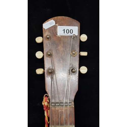 100 - An original 1940's gypsy jazz guitar with curved back.