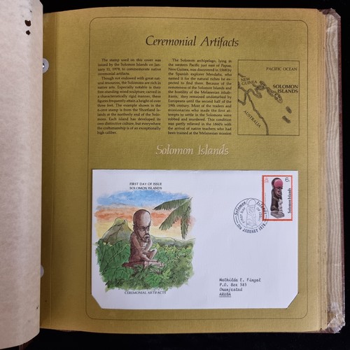 102 - A vintage stamp album with First Day Covers from around the world. Issued by a Postal Commemorative ... 