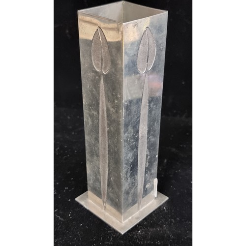 104 - A vintage Charles Rennie MacKintosh pewter bud vase. With a simple elegant flower stem design to the... 