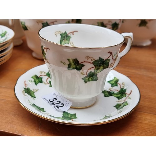 322 - 21 piece bone china tea set with a charming ivy leaf pattern with gilt edge.