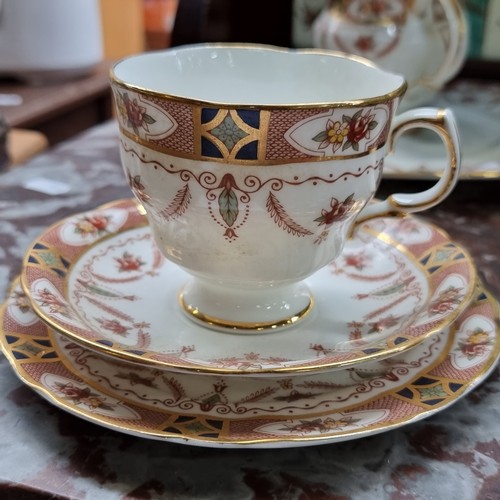 347 - Fifty eight pieces of Arklow fine Irish bone china in the ''Royal Linden'' pattern. Beautiful set in... 