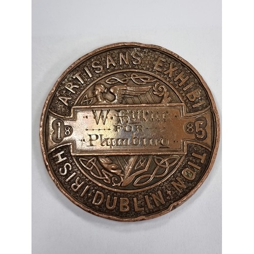 415 - A very interesting antique medallion from the Royal Dublin Society awarded to a  W Byrne for plumbin... 