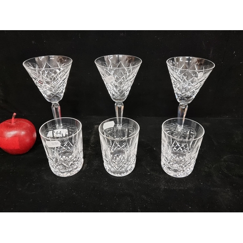 144 - A selection of six glasses by Waterford crystal including three tumblers in the Lismore pattern, wit... 