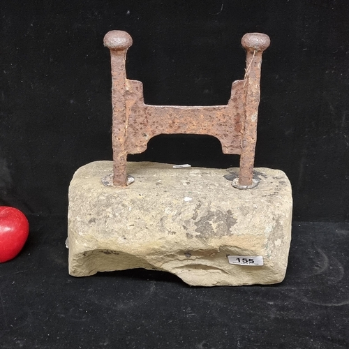 155 - A 19th century boot-scraper, mounted in stone with attractive patina and age.