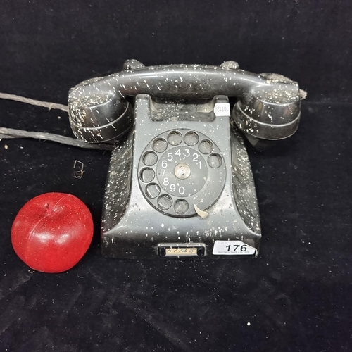 176 - A vintage Bakelite rotary dial telephone. Made in Sweden by Edison. Nice old one.