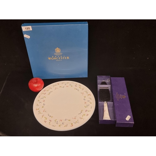 180 - Two lovely boxed Royal Worcester porcelain items, including a pretty cake knife and a large cake pla... 