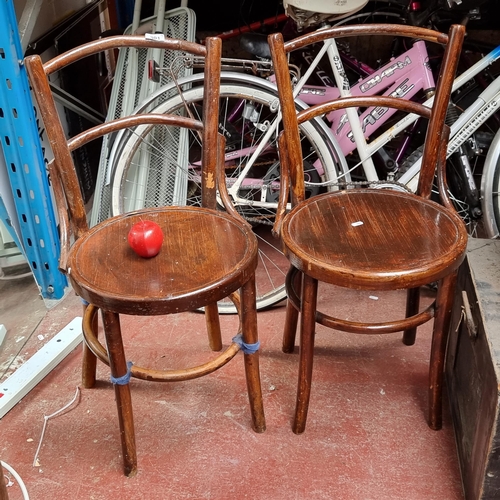 301 - Two lovely vintage bent wood chairs with circular seat and open back.