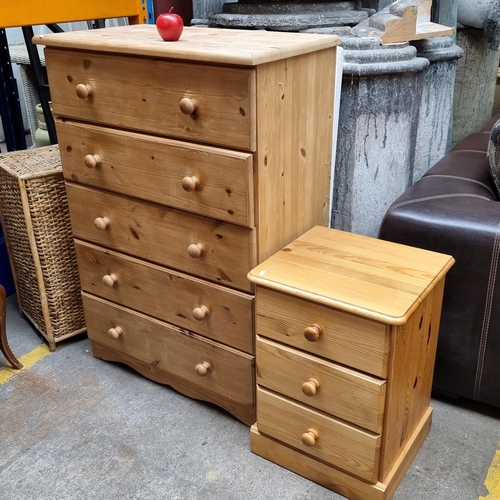 305 - A lovely 5 drawered chest of drawer and a matching 3 drawer bedside table, both in solid pine.