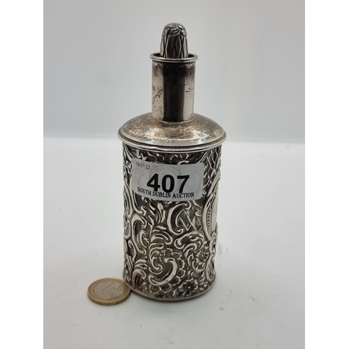 407 - A very attractive perfume glass bottle, with attractive Acanthus leaf and foliate exterior and sterl... 