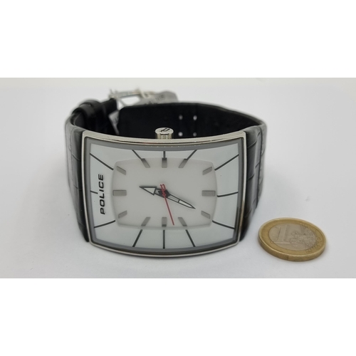 426 - A police water resistant wrist watch, with ceramic batton dial and luminous sweep second hand. Fitte... 