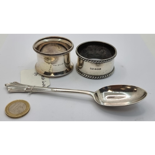 433 - Three sterling silver items. The first is a Victorian desert spoon with a nice fluted finial. Togeth... 