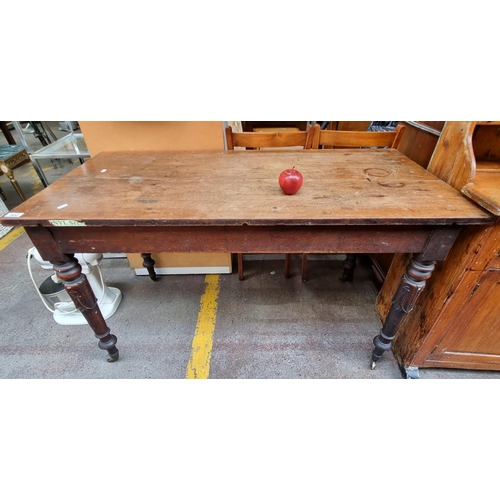 500 - A very attractive 19th century table with richly carved legs on brass castors. Lovely age to this pi... 