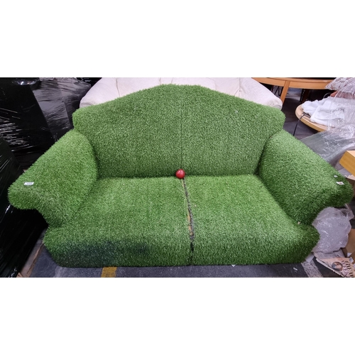 658 - Super fun  two seater sofa covered in astro turf would make a great addition to any garden space.