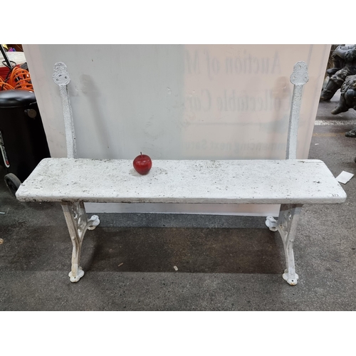 673 - An antique cast metal bench, set into a wonderful cast metal frame, with open work sides. Missing th... 