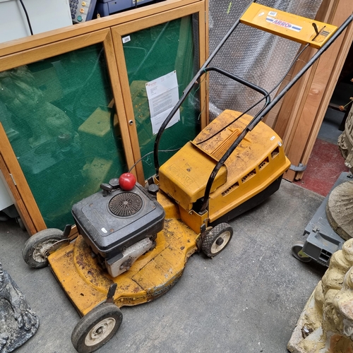 680 - A very large Briggs & Stratton Quantum35 lawnmower. unchecked.