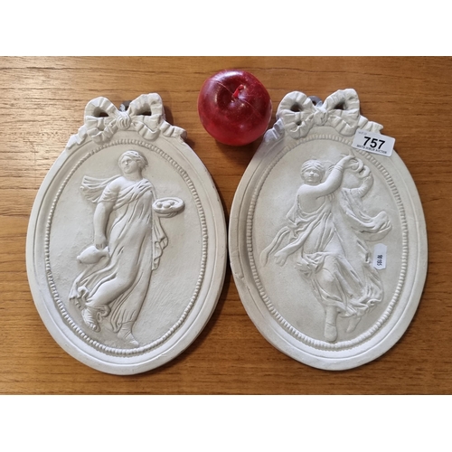 757 - Two beautiful neoclassical style ceramic plaques featuring classical women and a ribbon border.