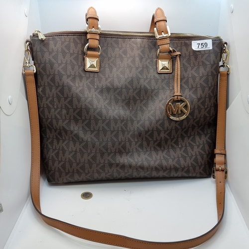 759 - A Large Genuine Michael Kors Monogram print Tote style large handbag with long handles, a should str... 