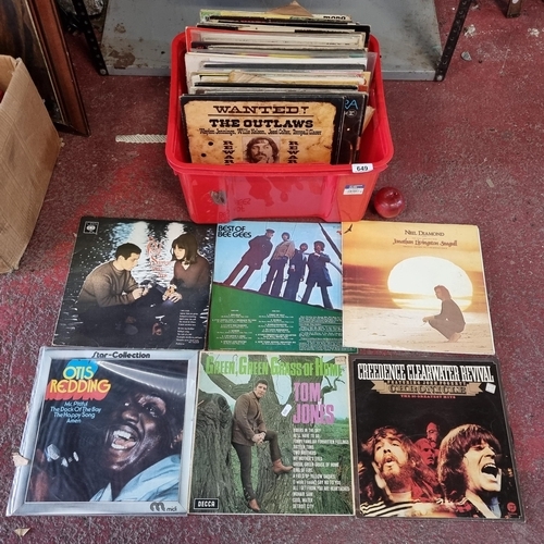 649 - A large collection of vinyls including Paul Simon, Bee Gees and Neil Diamond etc.