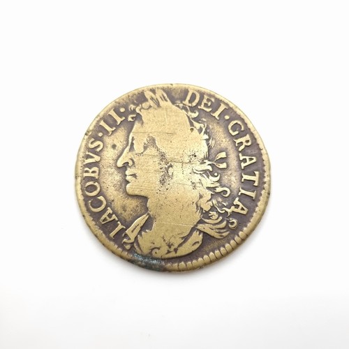 21 - A highly unusual and interesting large Gun Money coin, dated November 1689. Coin is in impressive co... 