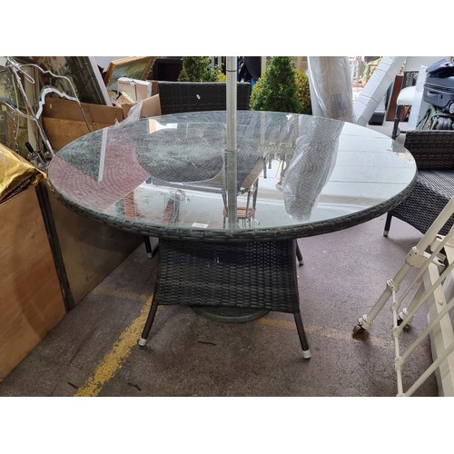 770 - A brilliant outdoor dining set including a round table with glass top and umbrella & base, alongside... 