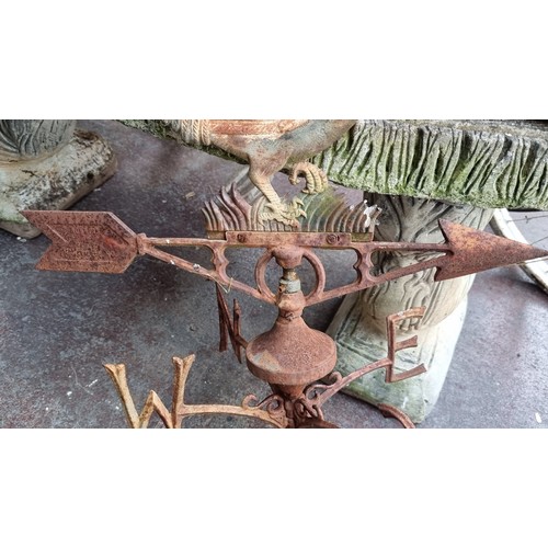 694 - Star lot : A very heavy cast metal weather vane surmounted with a cockerel. Lovely age and patina to... 