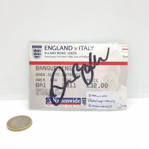 10 - An England vs Italy ticket from the 27th of march, 2002. Hand signed by David Beckham. England lost ... 