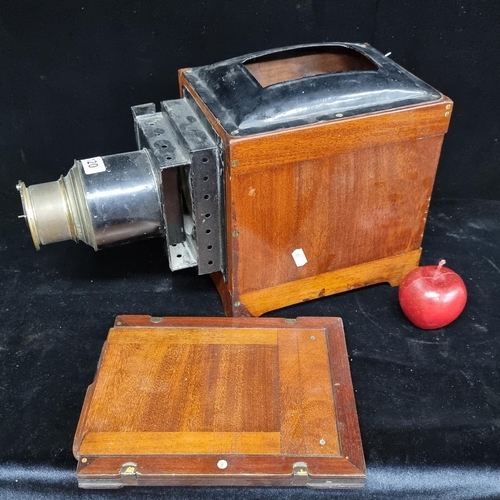 120 - A very interesting antique magic lantern projector held in a wooden box with a triple extension bras... 