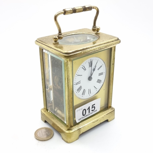 15 - A handsome example of an antique mechanical  French brass carriage clock, with original top carrier ... 
