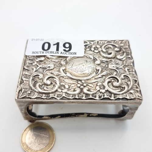 19 - A large Repousse relief large vesta sterling silver case, with the inscription 