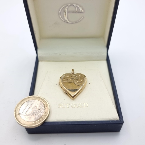 56 - A 9ct gold heart shaped pendant locket, with attractive foliate detail. Weight: 3.90 grams.