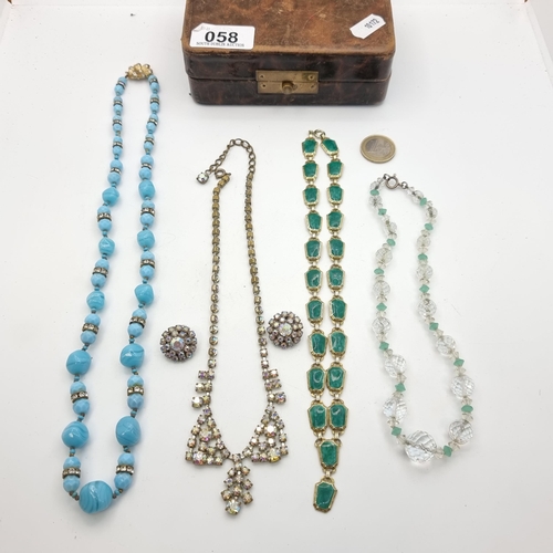 58 - A collection of jewellery items, including a striking Aurora Borealis necklace, a Malachite necklace... 